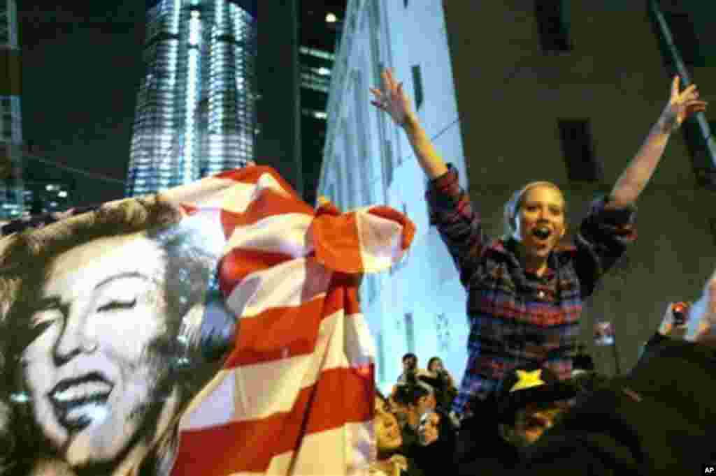 People celebrate at ground zero in New York Monday May, 2, 2011 after President Barack Obama announced Sunday night, May 1, 2011, that Osama bin Laden was killed in an operation led by the United States (AP)