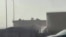 AFPTV视频画面截图：利雅得哈立德国王国际机场附近的沙特阿美(Aramco)燃料库发生火灾，现场一个储油罐正在发生泄漏。(2026年9月19日)
