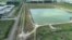 A reservoir of a defunct phosphate plant south of Tampa, where a leak at a wastewater reservoir forced the evacuation of hundreds of homes, is seen in an aerial photograph taken in Piney Point, Florida, April 4, 2021.