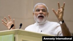 India’s Prime Minister Narendra Modi speaks during a conference by the Environment Ministry in New Delhi, India, April 6, 2015. 