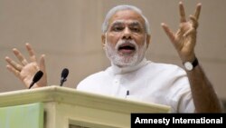 India’s Prime Minister Narendra Modi speaks during a conference by The Environment Ministry in New Delhi, India, April 6, 2015. 