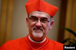 FILE -- Cardinal Pierbattista Pizzaballa OFM looks on after being elevated to the rank of cardinal at the Vatican, September 30, 2023.