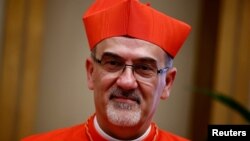FILE - Cardinal Pierbattista Pizzaballa OFM looks on after being elevated to the rank of cardinal at the Vatican, September 30, 2023. 