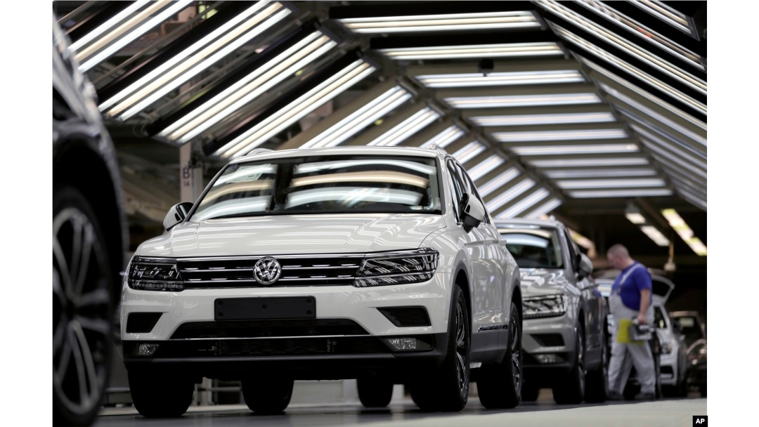 FILE - In this March 8, 2018 photo Volkswagen cars are pictured during a final quality control at the Volkswagen plant in Wolfsburg, Germany.