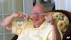 Theodore "Dutch" Van Kirk, navigator on the B29 Superfortress that dropped the first atom bomb on Hiroshima, Japan, talks about the flight of the Enola Gay at his home in Stone Mountain, Georgia, July 18, 2005.