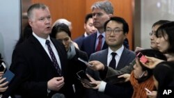 FILE - U.S. Special Representative for North Korea Stephen Biegun, left, speaks to the media with South Korea's Special Representative for Korean Peninsula Peace and Security Affairs Lee Do-hoon, center right, at Foreign Ministry in Seoul, South Korea, Dec. 21,