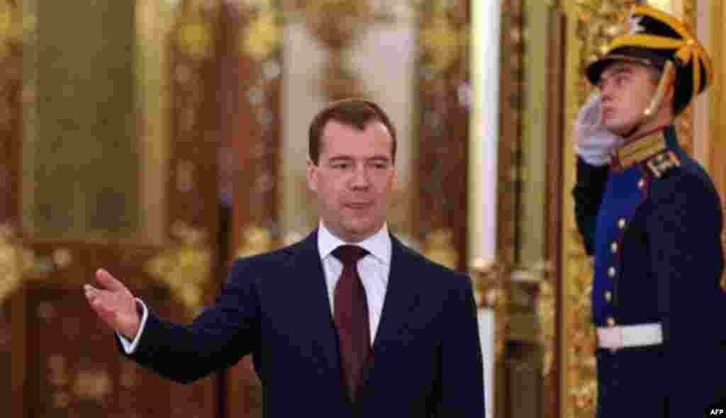 Russian President Dmitry Medvedev welcomes participants during the meeting of heads of states of the Supreme Eurasian Economic Council, in the Moscow Kremlin, Moscow, Russia, Monday, Dec. 19, 2011. The meeting is a part of a summit of the Eurasian Economi