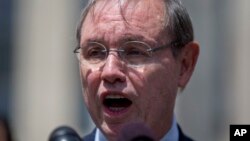 FILE - Dan Webb speaks outside federal court in Washington, Aug. 14, 2013. Republicans in Chicago exemplify the Donald Trump conundrum that many of the party’s top donors and fundraisers find themselves in this year.