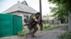 UN Urges Warring Sides in E. Ukraine to Uphold Minsk Agreement