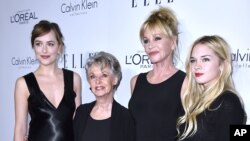 From left: Dakota Johnson, Tippy Hedren, Melanie Griffith and Stella Banderas attend the 2015 ELLE Women in Hollywood Awards at the Four Seasons Hotel in Los Angeles, Oct. 19, 2015.