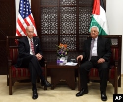 US Vice President Joe Biden, left, and Palestinian President Mahmoud Abbas, meet at the presidential compound in Ramallah, West Bank, March 9, 2016.