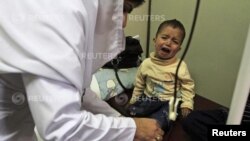 A child suffering from Thalassaemia undergoes a blood transfusion process at Pakistan Institute of Medical Sciences (PIMS) in Islamabad. 