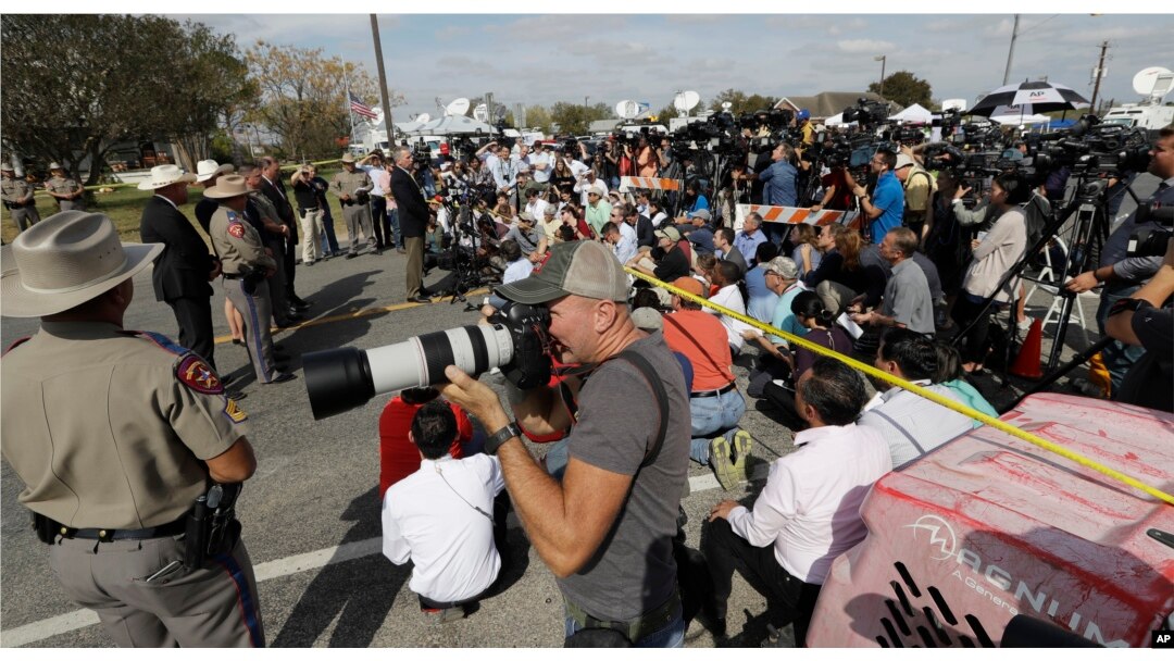 Law enforcement officials hold a news conference Tuesday, updating information on the Sunday shooting at the First Baptist Church of Sutherland Springs, Texas. A man opened fire in the church, killing more than two dozen and injuring others.
