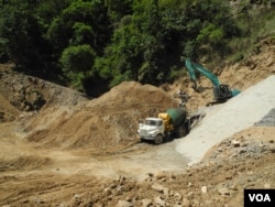 Roads are being widened in Bhutan both to cope with the tourist influx and for building new hydroelectric projects. (A. Pasricha/VOA)