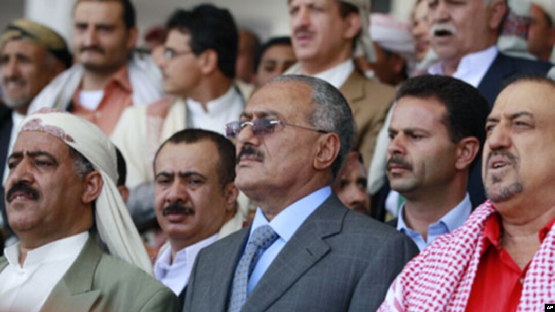 Yemen's President Ali Abdullah Saleh (C) attends a rally held by pro-government supporters in Sanaa, May 13, 2011