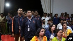 Indian Space Research Organization (ISRO) employees react as they listen to an announcement by organizations's chief Kailasavadivoo Sivan at its Telemetry, Tracking and Command Network facility in Bangalore, Sept. 7, 2019.