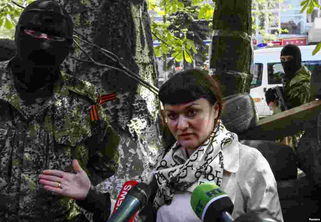 Pro-Russian separatists have detained a Ukrainian journalist, Irma Krat, accusing her of "war crimes" during the "Euromaidan" protests that toppled the Moscow-backed president, Slovyansk, Ukraine, April 21, 2014.