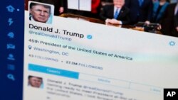 President Donald Trump's Twitter feed is photographed on a computer screen in Washington, April 3, 2017. 