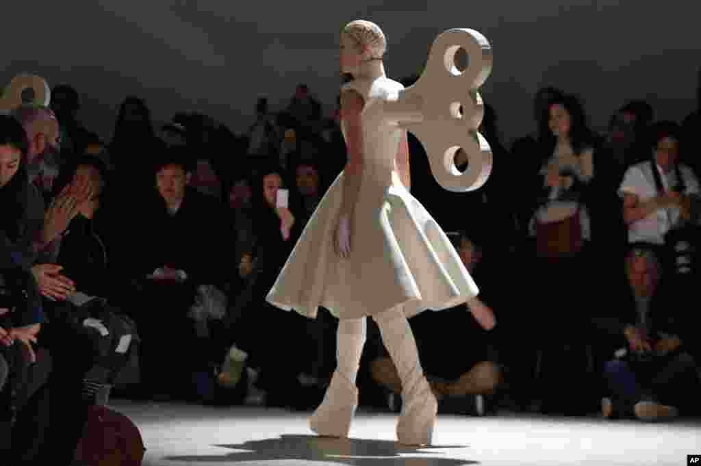 A model presents a creation of British fashion designer Gareth Pugh in Paris, France.