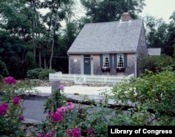 A Cape Cod-style home, a simple, rectangular structure, in Cape Cod, Massachusetts. (Photo by Carol Highsmith)