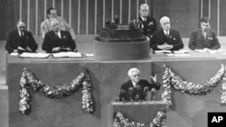 File - Joseph Paul Boncour of France, center, addresses the final session of the United Nations conference after the creation of its charter, as U.S. President Harry S. Truman, second from top left, and U.S. Secretary of State Edward R. Stettinius, second