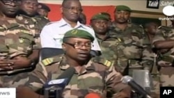 TV frame grab shows Colonel Gokoye Abdul Karimou, spokesman for the Niger millitary junta delivering a televised statement in Niamey, 19 Feb 2010