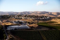 A general view picture shows the Jewish settlement of Kochav Hashachar in the Israeli-occupied West Bank, June 18, 2020.