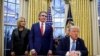 U.S. President Donald Trump signs an executive order in the Oval Office at the White House