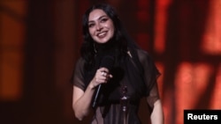 Charli XCX receives the award for artist of the year during the BRIT Awards at the O2 Arena in London, March 1, 2025.