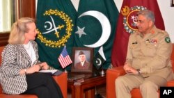 Alice Wells, U.S. deputy assistant secretary of state, meets with Pakistani army chief Gen. Qamar Javed Bajwa to discuss how to ensure peace in Afghanistan following a recent cease-fire between the Taliban and Kabul, in Rawalpindi, Pakistan, July 3, 2018.