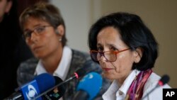 Luz MarinLuz Marina Monzon, left, director of the missing persoa Monzon, left, director of the missing person's unit, speaks during a presentation on information on those disappeared during the nation's civil conflict, in Bogota, Colombia, Aug. 20, 2019.