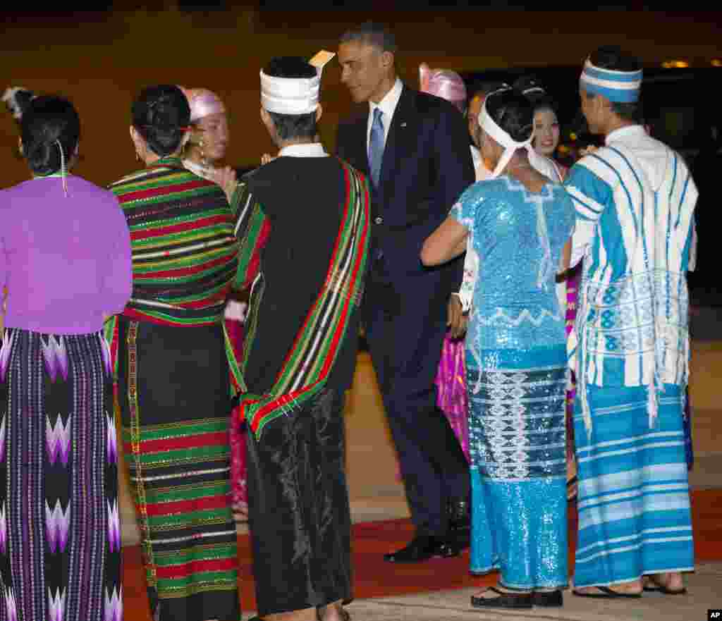 President Barack Obama is greeted upon his arrival on Air Force One at Naypyitaw International Airport, in Naypyitaw, Myanmar, Nov. 12, 2014.