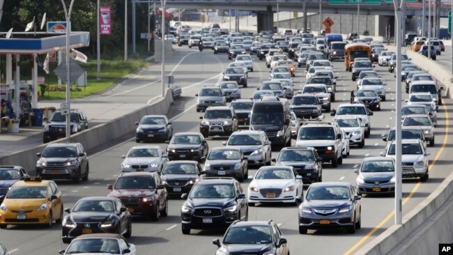 Cars are seen on the Grand Central Parkway pass LaGuardia Airport in New York, Aug. 1, 2018.