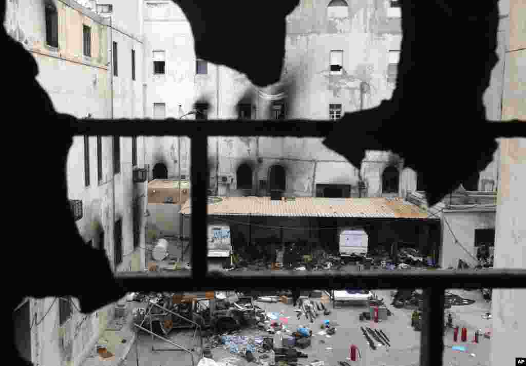 A state security building taken over by anti-government protesters is seen in Benghazi city, Libya, February 23, 2011. (Reuters Image)