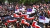 Thousands of people gather outside New Zealand's parliament to protest a proposed law that would redefine the country's founding agreement between Indigenous Maori and the British Crown, in Wellington November 19, 2024.