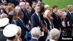 Президент США Барак Обама с супругой (в центре). Вашингтон, округ Колумбия. 22 сентября 2013 г.
