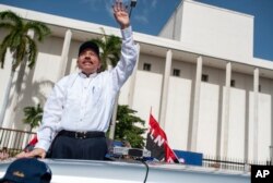 Nicaraguan President Daniel Ortega arrives to the Juan Pablo II plaza to celebrate the 39th anniversary of the Sandinista revolution, in Managua, July 19, 2018.