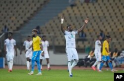 Ghana's Daniel Amartey celebrates a goal scored by captain Andre Ayew, during a match between Gabon and Ghana at the Ahmadou Ahidjo stadium in Yaounde, Jan. 14, 2022.
