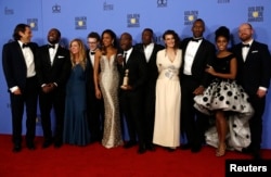 Cast and crew of "Moonlight" poses backstage with their award for Best Motion Picture - Drama at the 74th Annual Golden Globe Awards in Beverly Hills, CA Jan. 8, 2017.