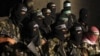 资料照片：2010年9月2日带着面罩的哈马斯武装人员在加沙举行记者会（美联社）