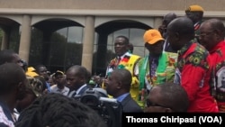 Emmerson Mnangagwa addressing Zanu PF members a day before attending the party's Annual National People's Conference in Esigodini, Matabeleland South province.