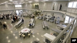 FILE - A photo of a unit of the Tacoma Northwest Detention Center in Tacoma, Wash.