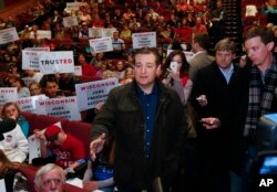 Republican presidential candidate Sen. Ted Cruz of Texas speaks to the media before watching the movie, "God's Not Dead 2," in Ashwaubenon, Wis., April 2, 2016.