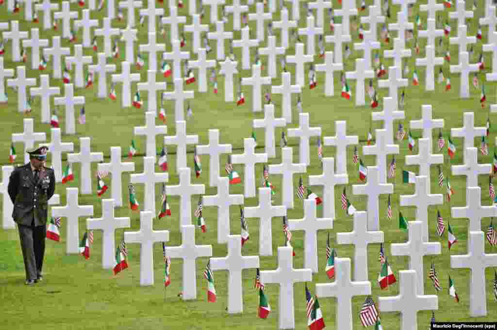 A man walks through the American Military Cemetery in Falciani during a ceremony marking the U.S. Memorial Day, on the outskirts of Florence, Italy.