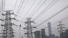 Gambar menara transmisi listrik di dekat Kawasan Pusat Bisnis (CBD) Beijing, China, 28 September 2021. (Foto: REUTERS/Tingshu Wang)