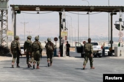 Israeli soldiers are seen patroling at the Allenby Bridge Crossing between the West Bank and Jordan, following a shooting incident at the crossing in the Israeli-occupied West Bank, Sept. 8, 2024.