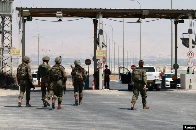 Israeli soldiers are seen patroling at the Allenby Bridge Crossing between the West Bank and Jordan, following a shooting incident at the crossing in the Israeli-occupied West Bank, Sept. 8, 2024.