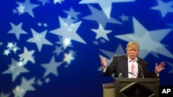 FILE - Donald Trump speaks to a group of Republican organizations at a Las Vegas hotel in 2011.