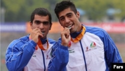 سعید فضل اولی(سمت راست)، عضو سابق تیم ملی قایقرانی ایران