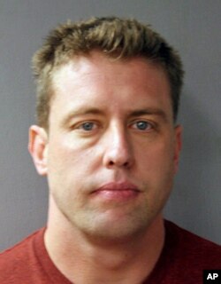 FILE - This undated file photo provided by the St. Louis Police Department shows former St. Louis police officer Jason Stockley.